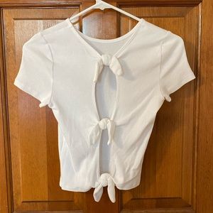 cute white crop top with bows and open back